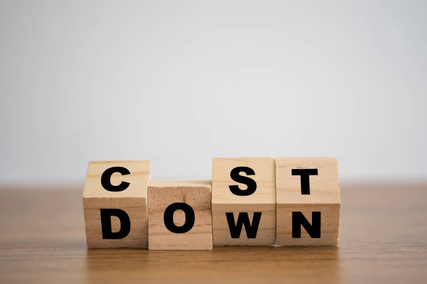 Image of wooden blocks with 'cost down' written on them